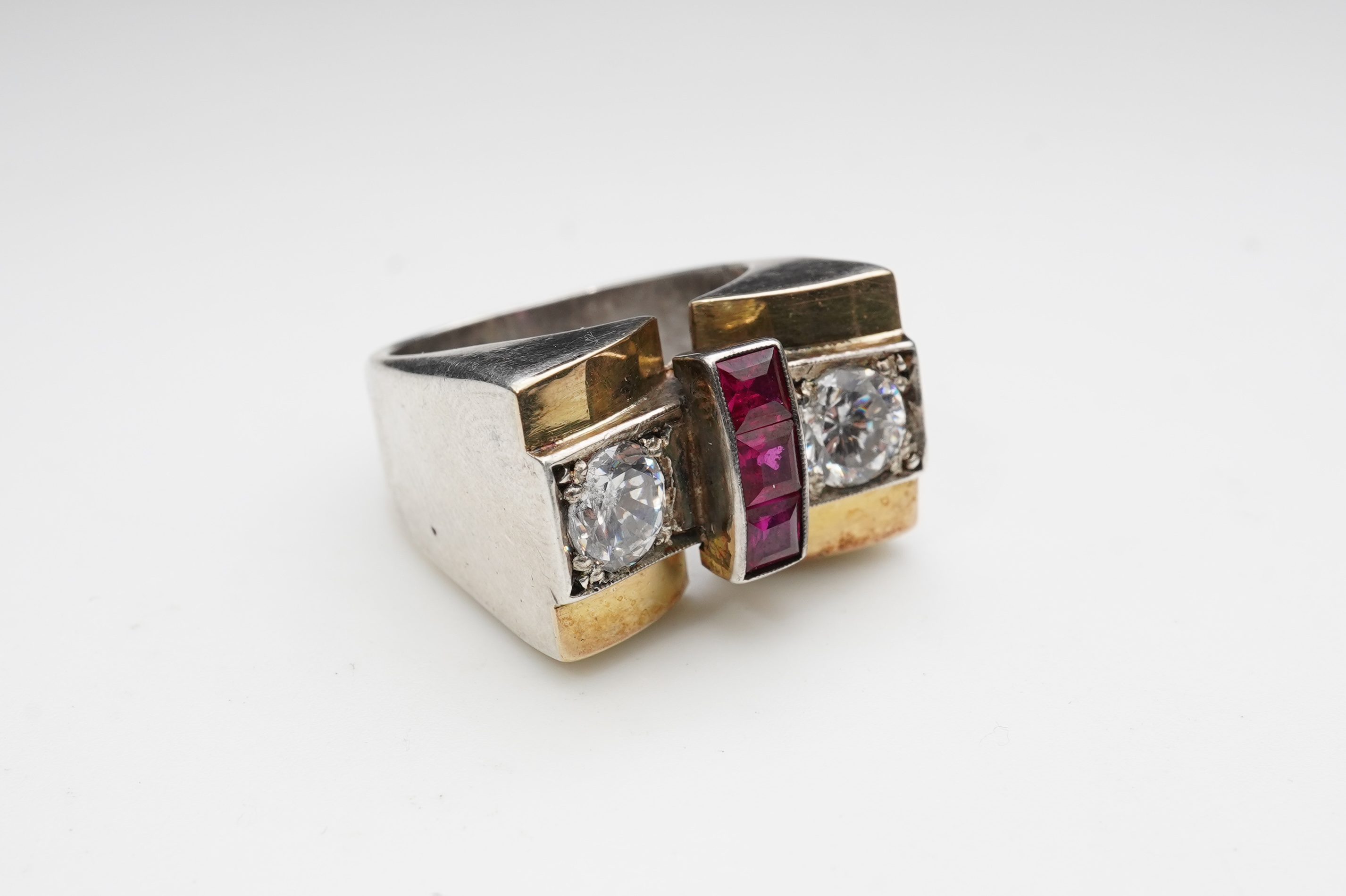 Two Retro synthetic stone and paste cocktail rings, 1940s
